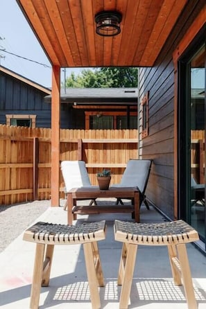 Shaded patio seats 4, perfect for morning coffee. Now features adjustable bamboo blinds!