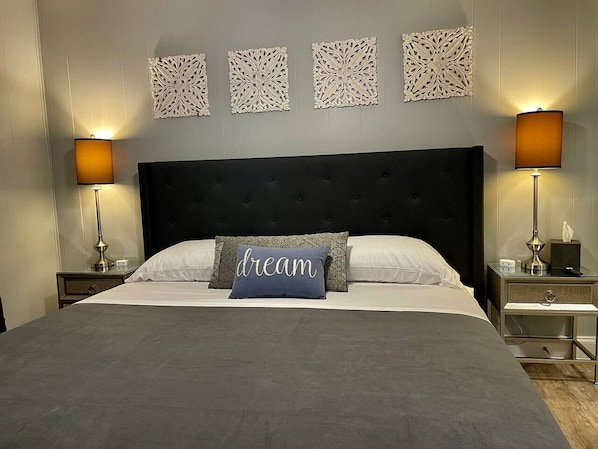 Comfortable, new king sized memory foam bed. Bedroom comes with Amazon Fire Smart TV, blackout curtains, walk in closet, full length mirror, USB fast charging plugs, ceiling fan, and extra blankets and pillows.