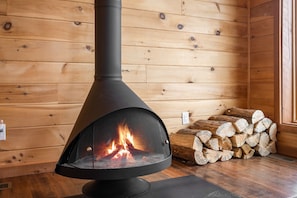 Wood burning stove in main living room.