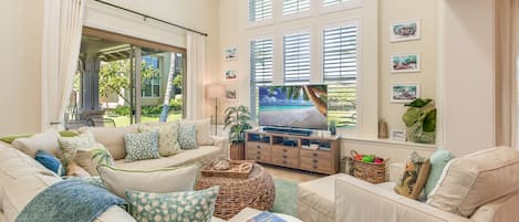 Located in beautiful Kulalani within the Mauna Lani community, Kulalani 1701 by Gather tropical villa is beautifully decorated and flooded with natural light