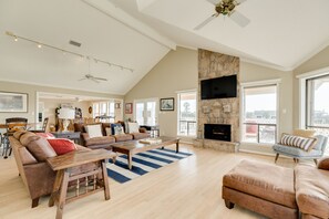 Spacious living area with warm inviting furniture