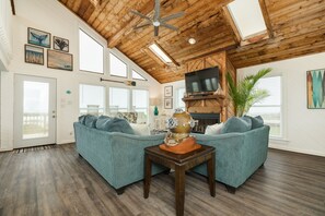 Enjoy movie nights or views of the Gulf from the comfortable living room