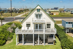 Enjoy beachfront views from 2 decks or the patio