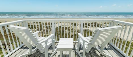 Enjoy the beachfront views from the deck