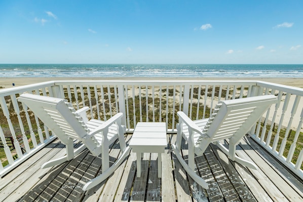 Enjoy the beachfront views from the deck