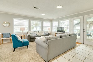 Relax with family in the bright & airy living area