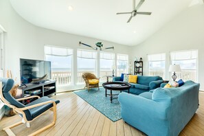 Walls of windows brighten up the living area