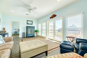 Bright and airy living room with wall of windows