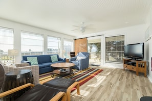 Bright and airy living room with wall of windows