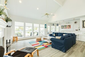 Bright and airy open living area with wall of windows