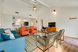 Abundant comfortable seating in the warm, inviting living area