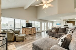 Bright & airy living area with wall of windows