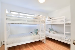 The back bedroom is located upstairs.
