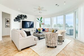 Bright and airy living area with pops of colorful decor