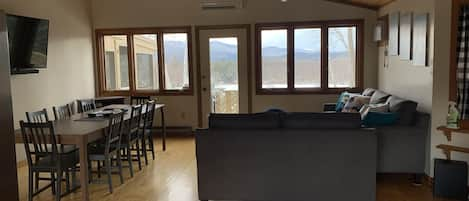 Upstairs living/dining room with beautiful mountain views and plenty of seating