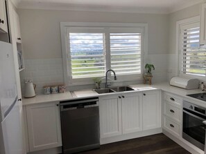 Fully equipped kitchen with spectacular country views out of the window, makes preparing meals that so much more enjoyable! 
