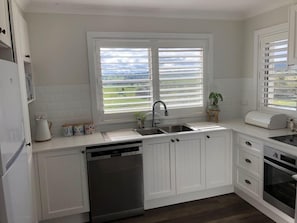 Fully equipped kitchen with spectacular country views out of the window, makes preparing meals that so much more enjoyable!