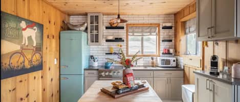 Spruced up beachy fun blended with the original Dillon Beach Cottage knotty pine
