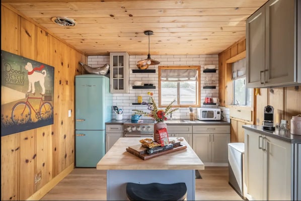 Spruced up beachy fun blended with the original Dillon Beach Cottage knotty pine