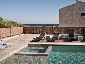 The villa features sea side views, and a pool with hydromassage