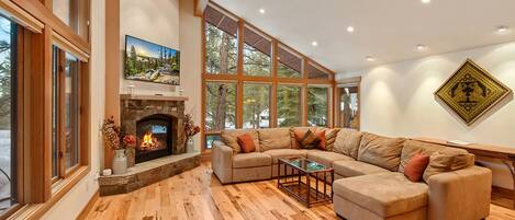 Spacious living space with Smart TV, and fireplace