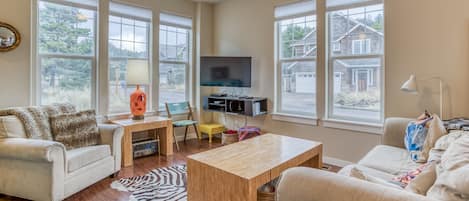 Living Area with television and ample lighting