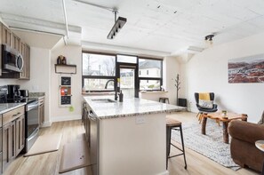 Open living, dining and kitchen space
