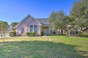 Property Exterior | 1,970 Sq Ft | Single-Story Home | Stairs Down to Lake
