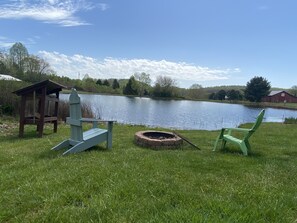 Stocked pond adjacent to the cabins. Beautiful views from the cabins. 