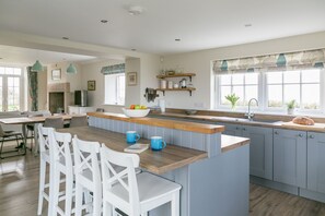 Open plan kitchen with breakfast bar