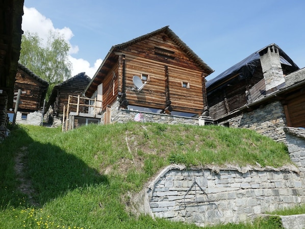 Sky, Plant, Property, Building, Wood, Land Lot, Cloud, Slope, Window, Cottage