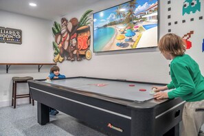 Air Hockey | 65" LED TV
