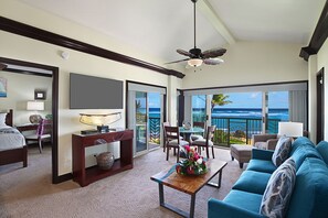 Living room with HDTV, Queen sized sleeper sofa and amazing ocean views