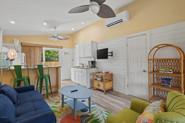 Bright and cheerful living area with beautiful coastal décor ensure the ideal island experience