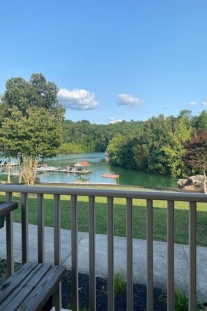 View from front porch. Boat slip immediately to the left of swim platform