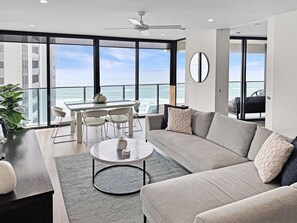 Open plan living and dining with ocean views