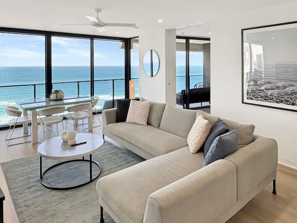 Open plan living and dining with ocean views