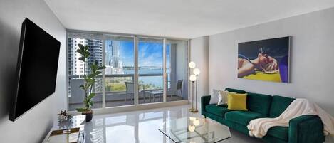 Living area, Roku streaming tv, balcony access, water views of Biscayne Bay