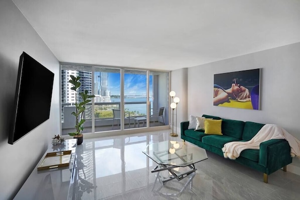Living area, Roku streaming tv, balcony access, water views of Biscayne Bay