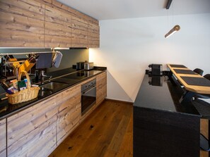 Well equipped kitchen with kitchen counter.