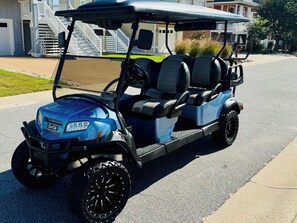 New 6 passenger Club Car Onward golf cart w/ chair holder & Bluetooth speakers.