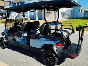 New 6 passenger Club Car Onward golf cart w/ chair holder & Bluetooth speakers.