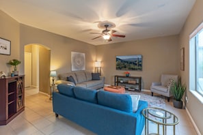 Gather in the cozy family room to watch TV, chat with a friend or supervise the pool deck.