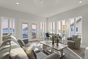 From the moment you walk into the main floor, you're met with the sunlight and views of the salt march and the Cherry Grove channel!