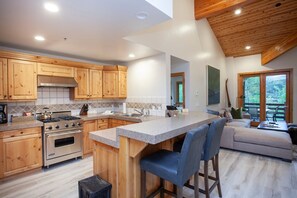 Room, Indoors, Kitchen Island, Flooring, Hardwood