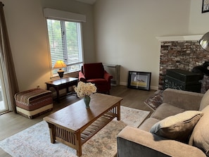 Plenty of seating in living room. Not shown is new wall-mounted television