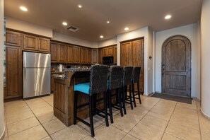 Front door and kitchen view 