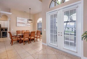 Front Entryway and Main Dining Room with Seating for Eight