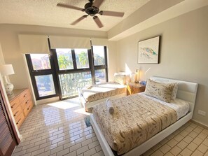 The third bedroom has two single beds, ideal for children or friends.