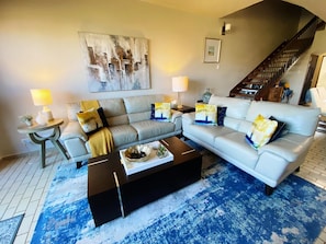 Welcome to our bright and stylish lounge to unwind after a day of excitement.